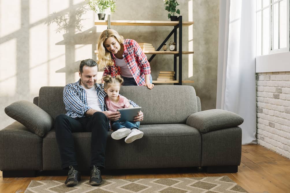 people on couch contacting ecowise pest control in new york city